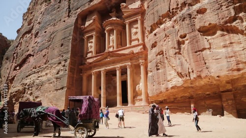 people in the antique site of petra photo