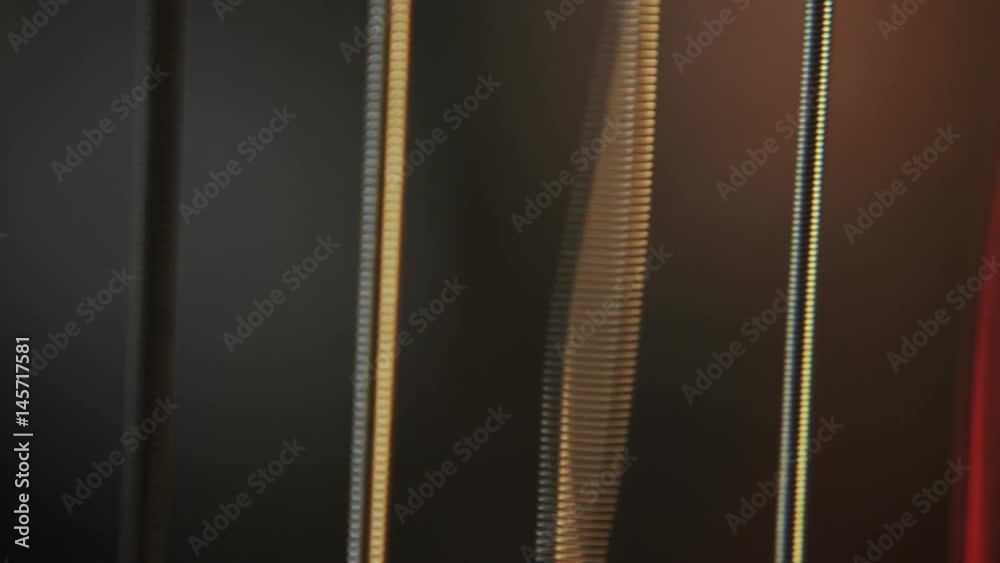 macro of strings vibrating while being played macro of strings vibrating while being played