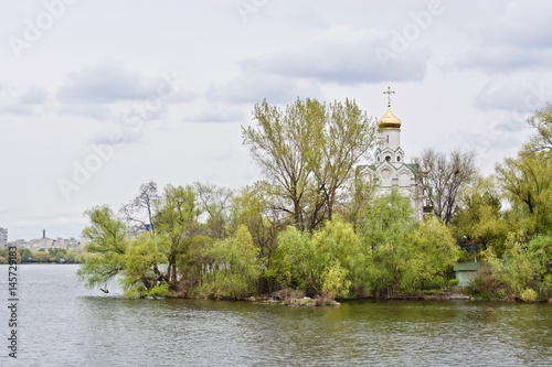 Church in the park with green trees