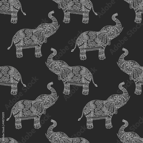 Seamless pattern with hand-drawn tribal styled elephant.