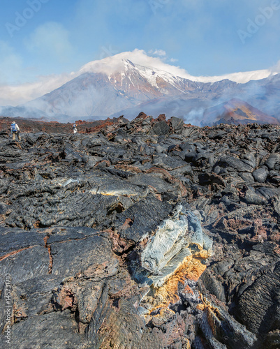 The active lava flow from a new crater on the slopes of volcanoe photo