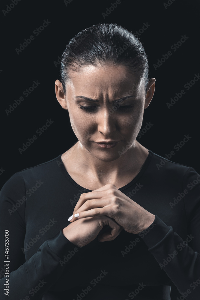 young fitness woman gesturing and posing isolated on black young fitness woman gesturing and posing isolated on black