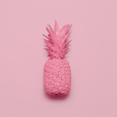 Pink pineapple on a pink background. Surreal minimal art