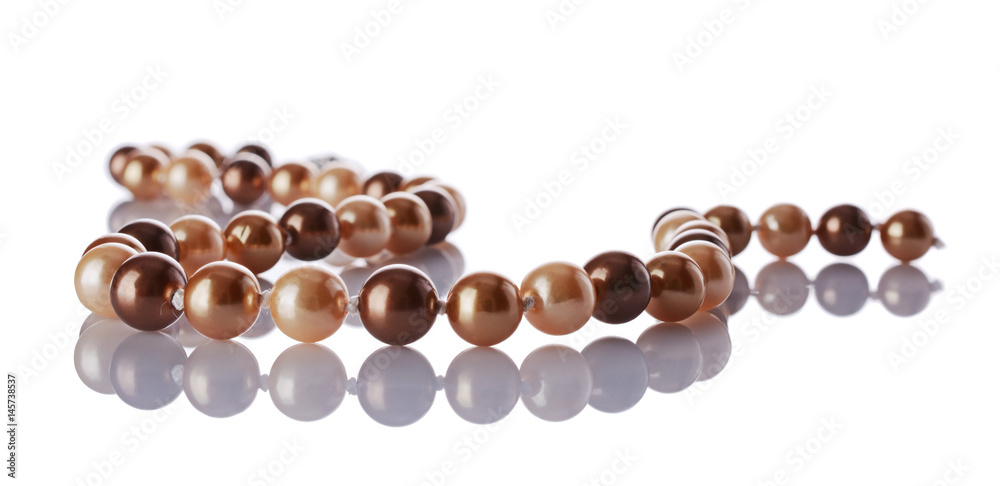 Luxury elegant golden pearl necklace close-up Luxury elegant golden pearl necklace close-up