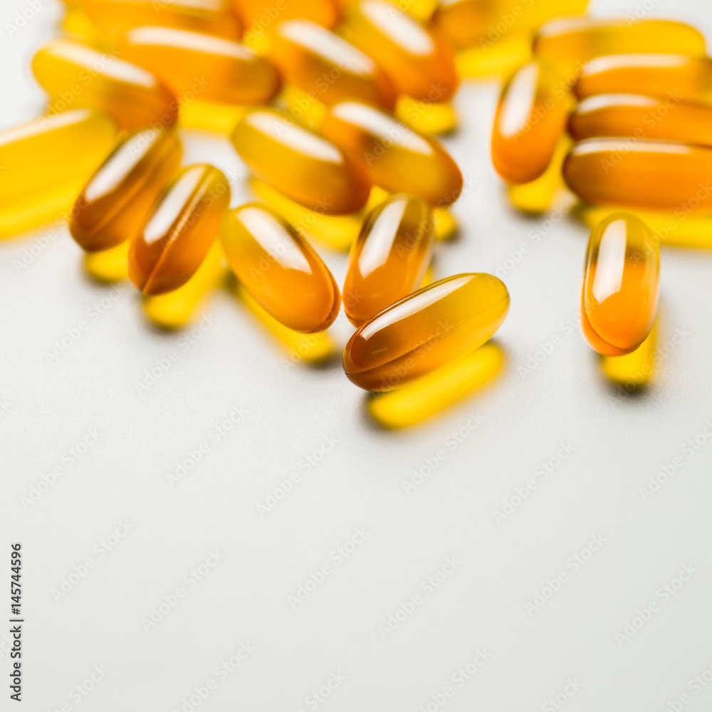 Vitamin e. Fish oil capsules on white background. Copy space for your text, high resolution product. Vitamin e. Fish oil capsules on white background. Copy space for your text, high resolution product.