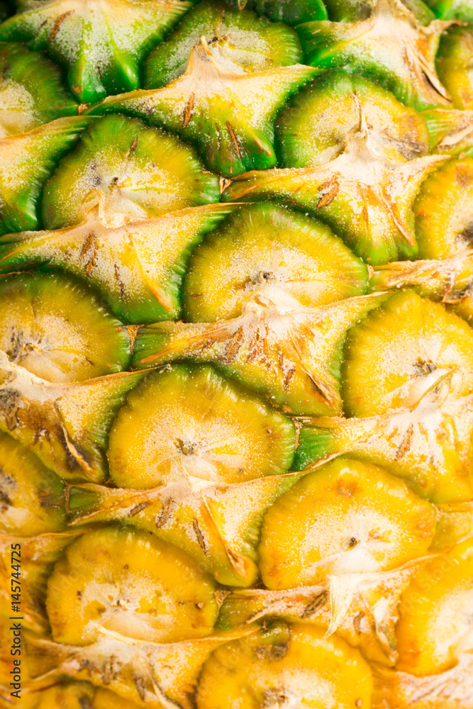 Pineapple fruit close-up. Texture of ananas pattern skin. Pineapple fruit close-up. Texture of ananas pattern skin.