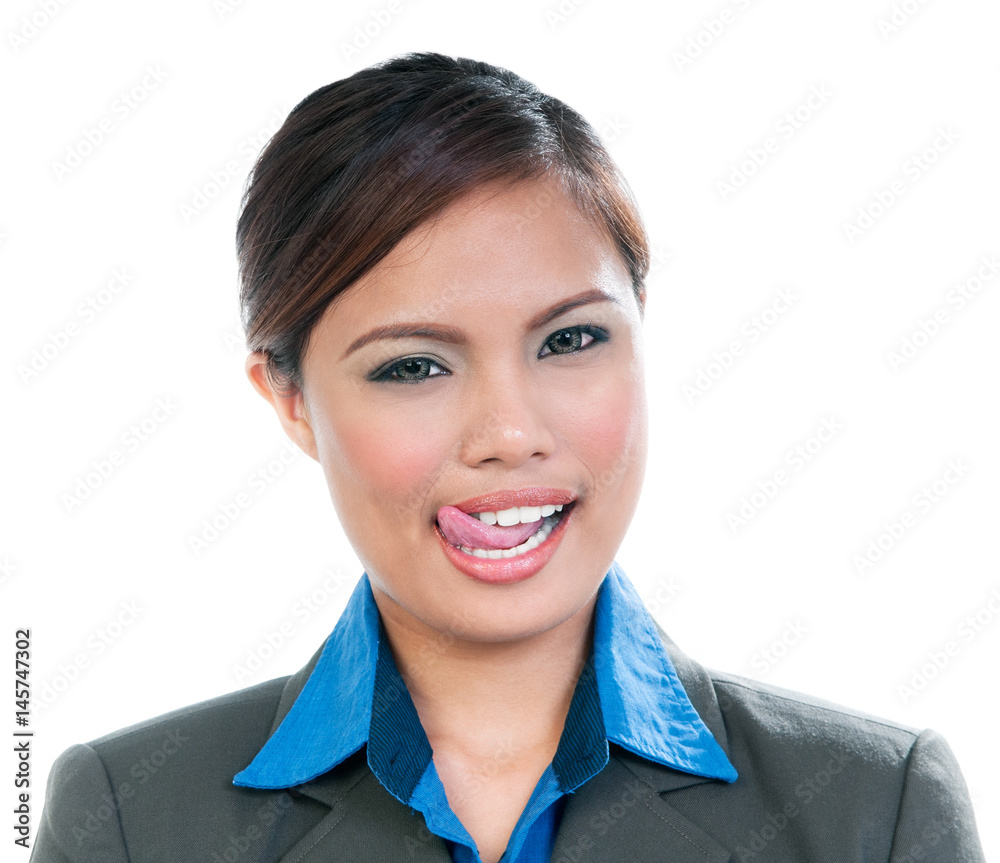 Portrait of a young woman licking lips over white background Portrait of a young woman licking lips over white background