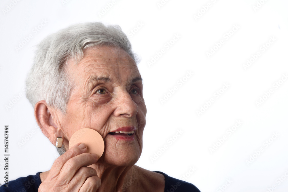 Senior woman make-up face on white background Senior woman make-up face on white background