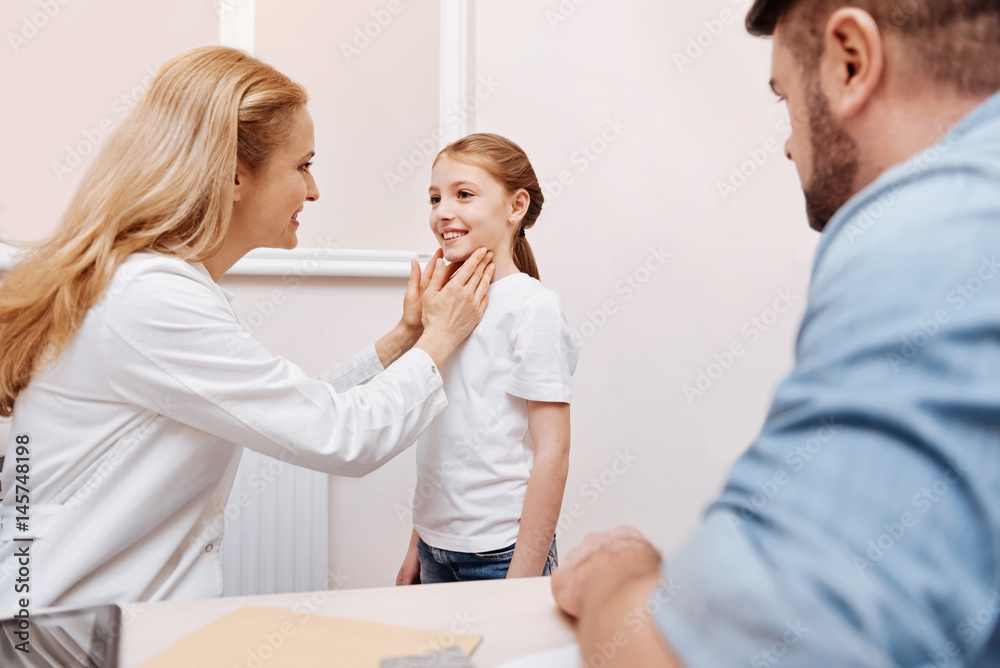 Attractive young patient keeping smile on her face Attractive young patient keeping smile on her face