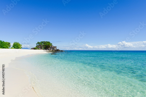 Beautiful White sand beach and blue sea at koh khai island in satun thailand