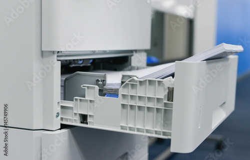 Reload the paper to printer tray