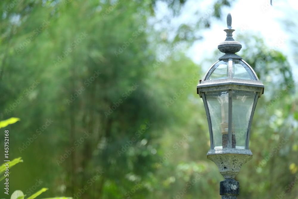 Old lamp with green background