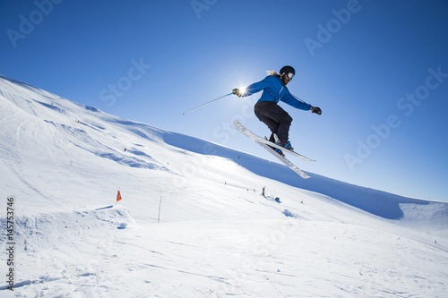 Freeride skier jumping.