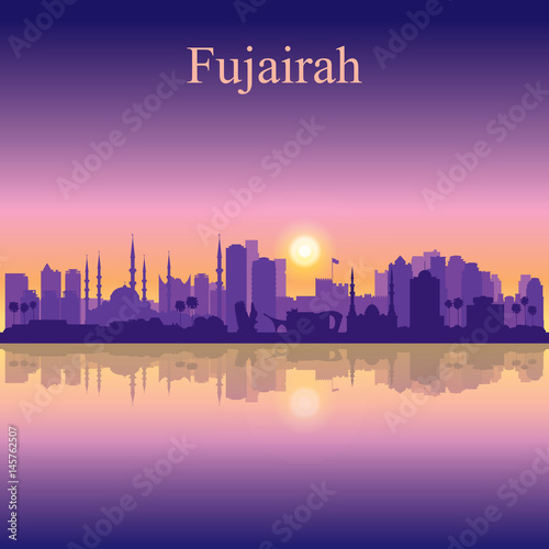 Fujairah silhouette on sunset background