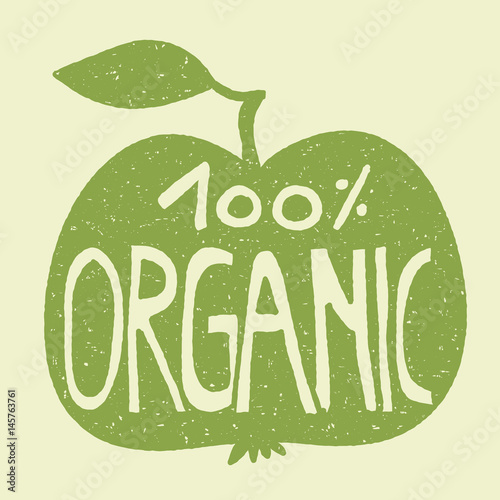 100% organic on a green apple.
