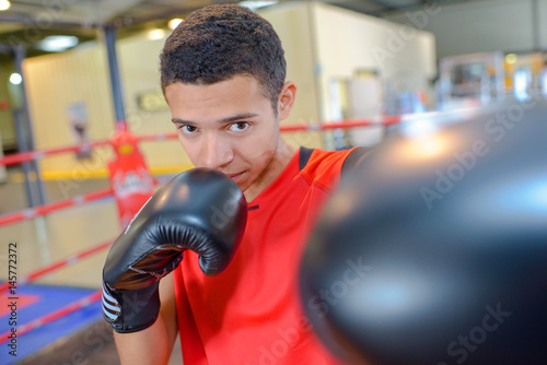 Young man boxing © auremar