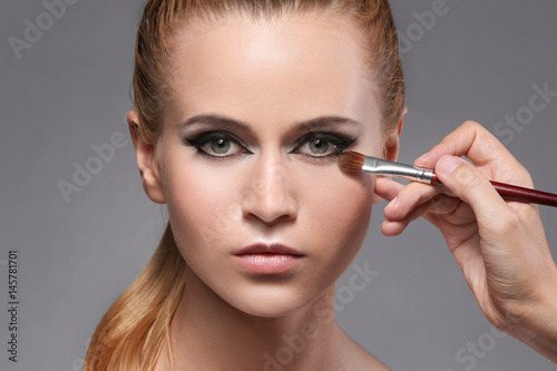 Beautiful young woman in be...