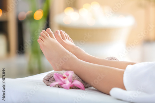 Wallpaper Mural Female legs on massage table in beauty salon Torontodigital.ca