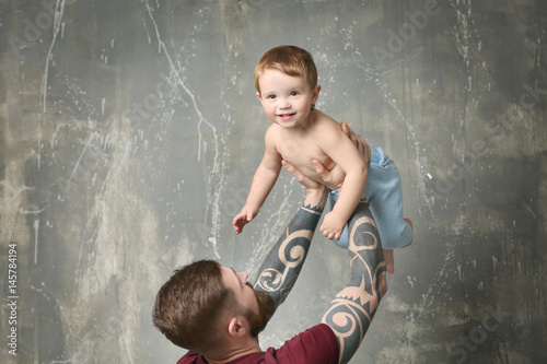 Handsome tattooed young man...