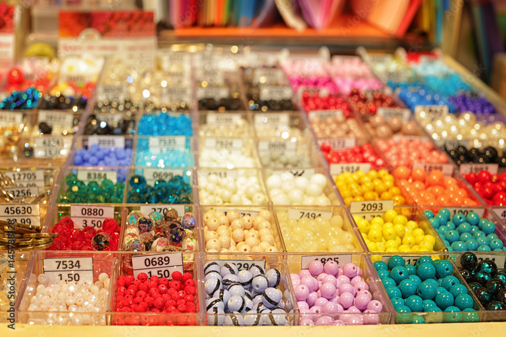 Assortment of beads in boxes at shop