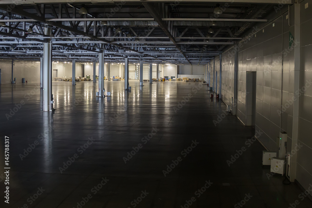 Large industrial hall of a vehicle repair station Large industrial hall of a vehicle repair station