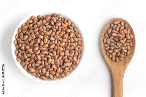 Brown Mulatinho Beans into a bowl photo