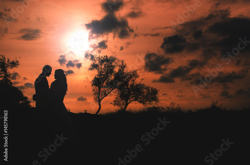 Couple at sunset is beautiful