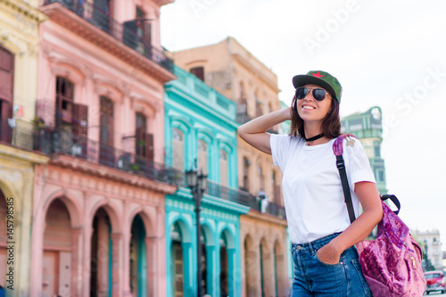Photography Tourist beautiful girl in popular area in old Havana, Cuba