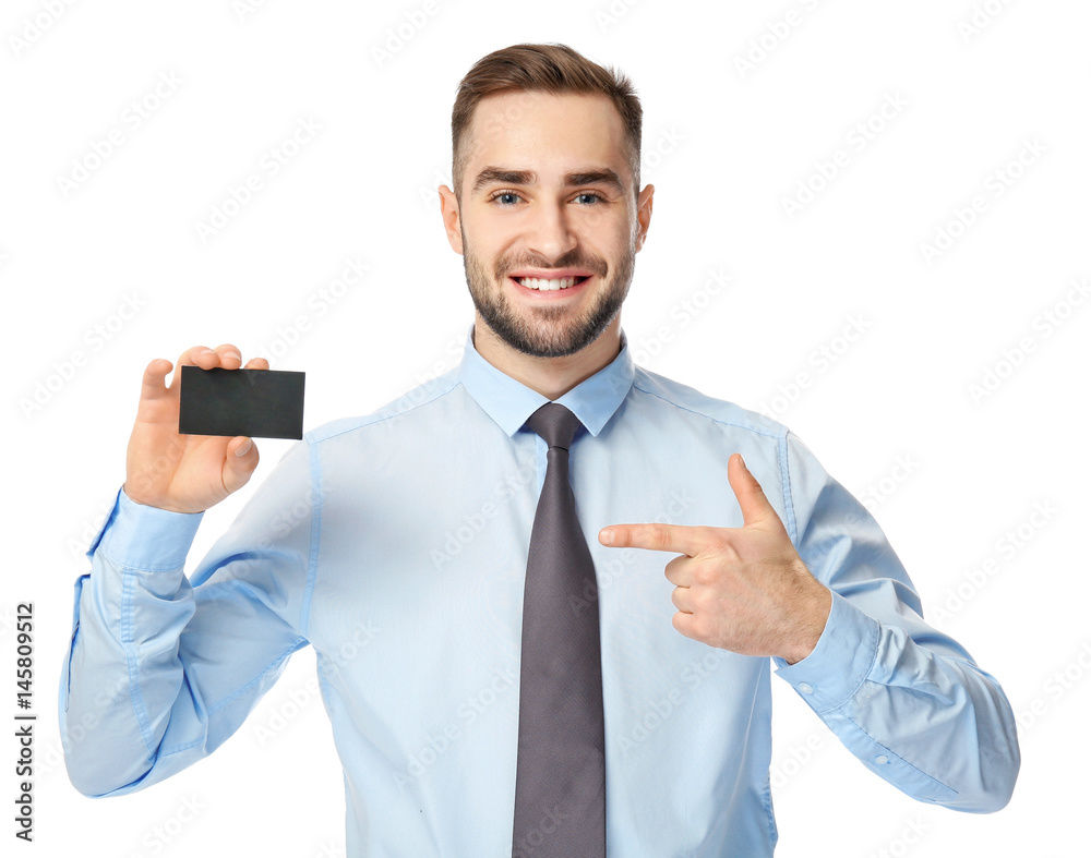 Handsome young man with business card on white background Handsome young man with business card on white background