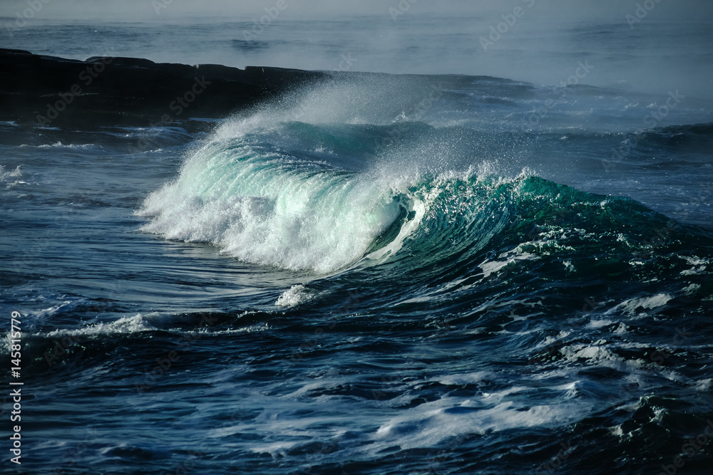 Big stormy ocean wave. Blue water background