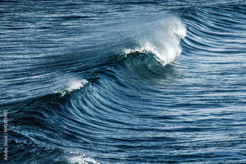 Fototapeta Naklejka Na Ścianę i Meble -  Big stormy ocean wave. Blue water background