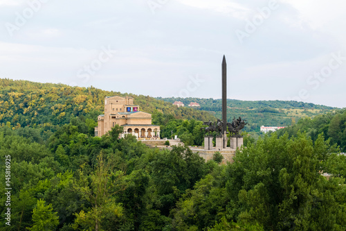 Asen's Monument surrounded by trees in Veliko Tarnovo, Bulgaria