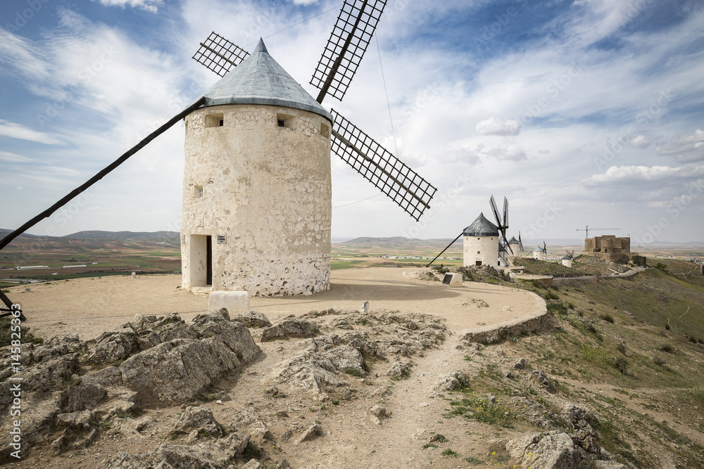 windmills and the Castle in Consuegra, province of Toledo, Castilla-La Mancha, Spain