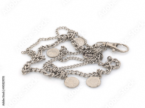 Chain with a lock, with coins on a white background. Isolated