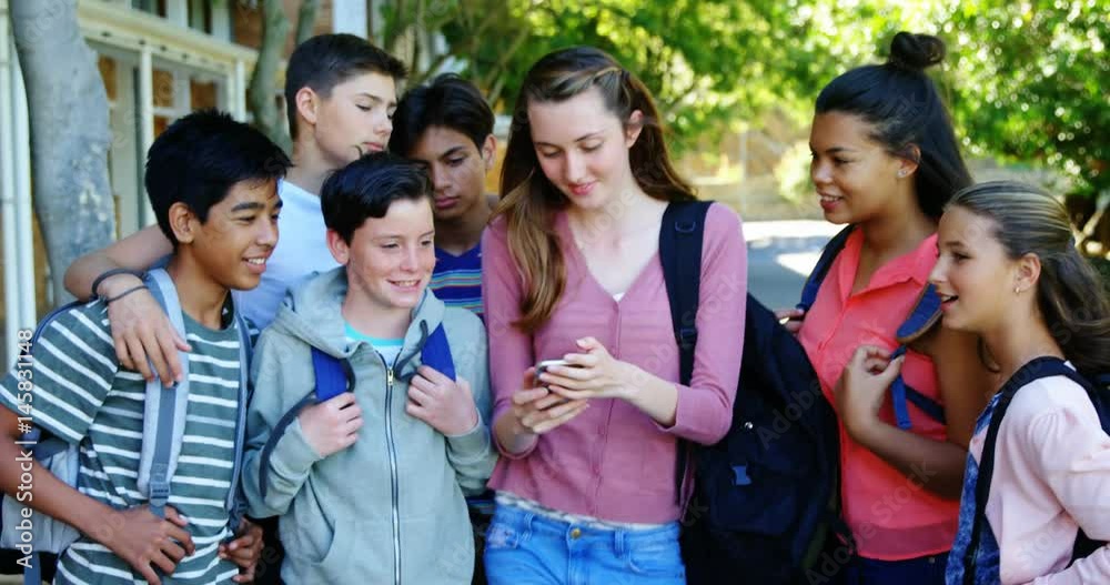 Happy students taking selfie on mobile phone Happy students taking selfie on mobile phone