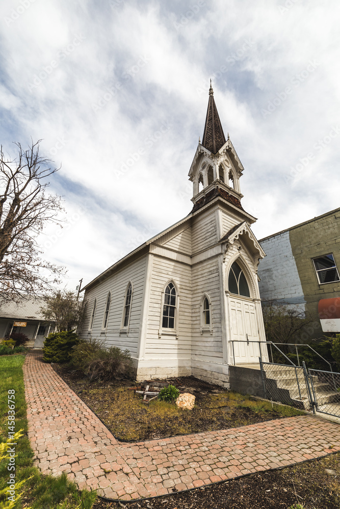 Fototapeta premium Old Church Building Under Blue Sky