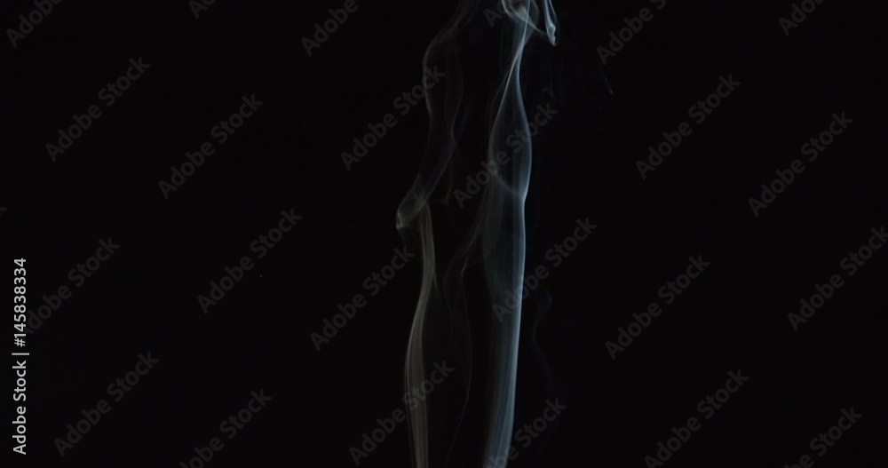 Magical wisps of smoke rise from bottom of frame as if from candle or fire Magical wisps of smoke rise from bottom of frame as if from candle or fire