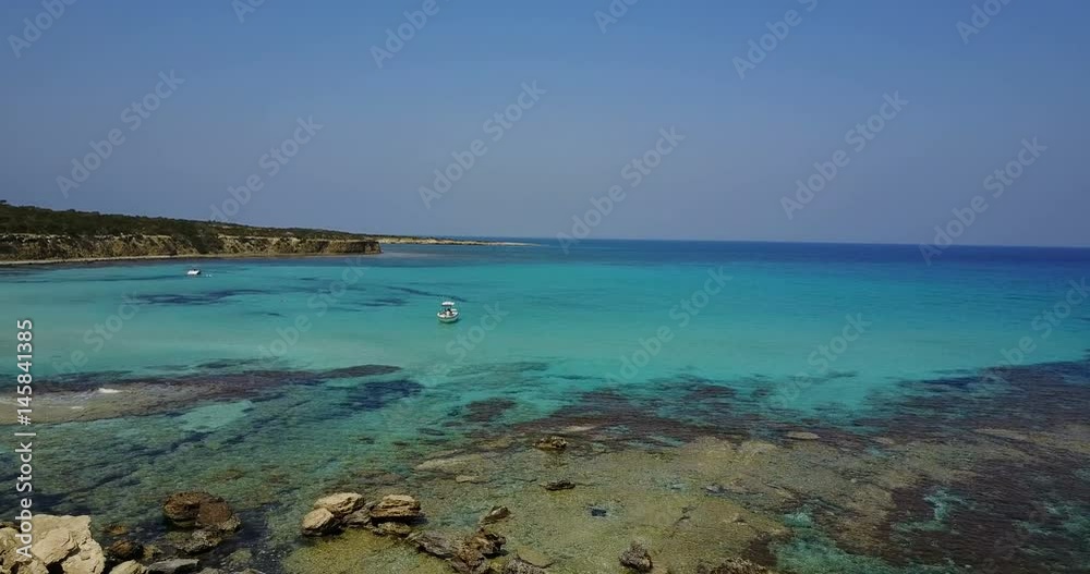 flying over the island. Landscape. Mediterranean Sea and the coast. Cyprus. City resort. Drone Point of View. Blue lagoon with rocks and stones. Mountains,Sea,paradise. flying over the island. Landscape. Mediterranean Sea and the coast. Cyprus. City resort. Drone Point of View. Blue lagoon with rocks and stones. Mountains,Sea,paradise.
