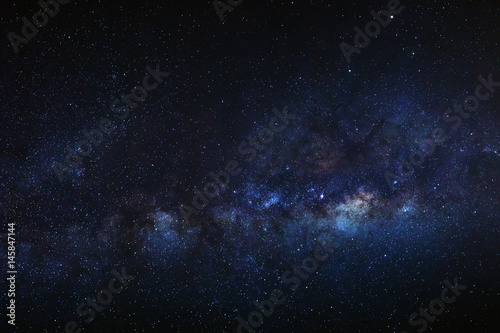 Milky way galaxy with stars and space dust in the universe, Long exposure photograph, with grain.