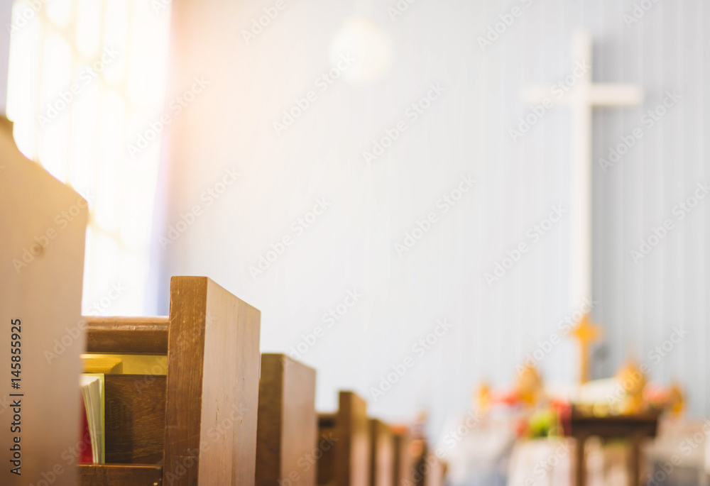 Fototapeta premium wooden bench rows in the church
