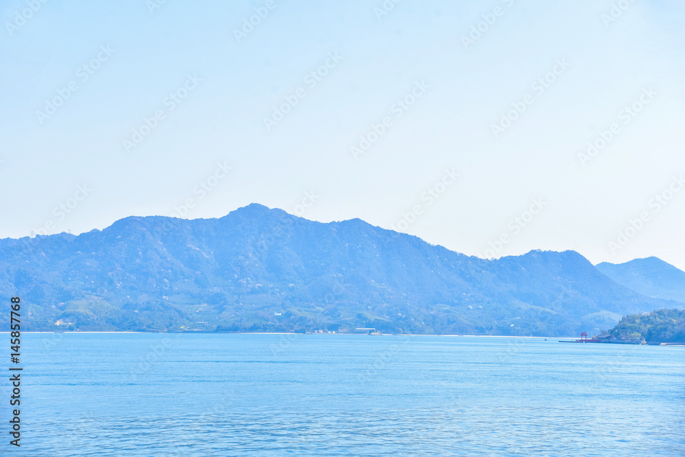 Beautiful View of Deep Blue Sea and Mountain Ranges in Japan