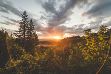 Glasbilder Natur Landschaft und Himmel bei Sonnenuntergang  © The Adaptive