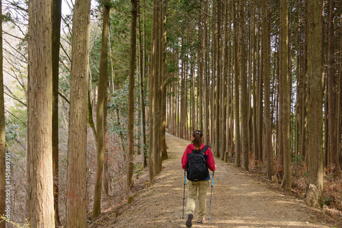 Woman hiking to Takayamafudo (in Japan)