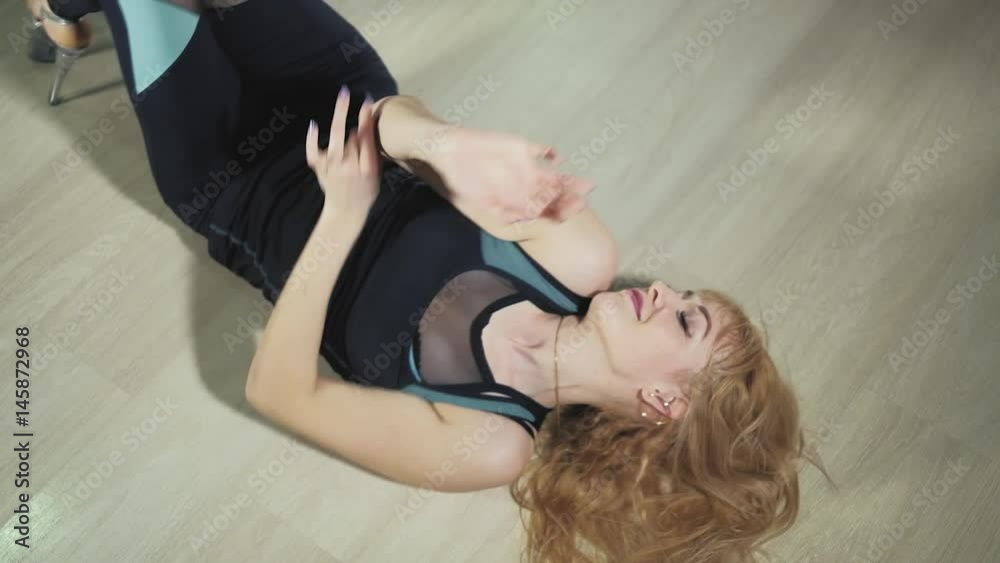 Sexy blonde erotically moving lying on the floor 4k Sexy blonde erotically moving lying on the floor 4k