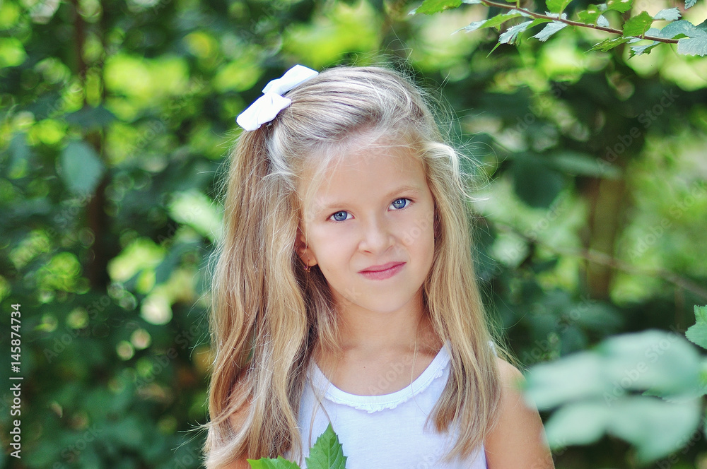 A cute blonde little girl A cute blonde little girl