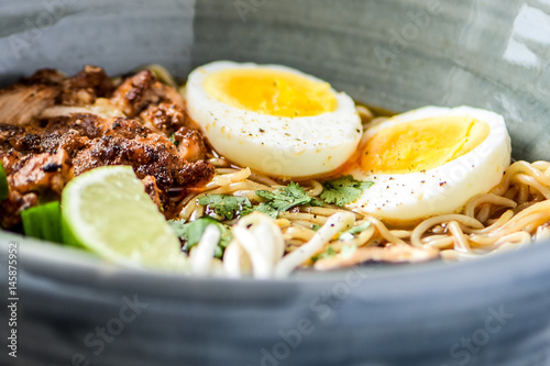 Wallpaper Mural bowl of chicken ramen noodles with hard boiled egg, cilantro and bean sprouts Torontodigital.ca