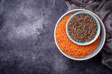 Bowls with red and black lentils