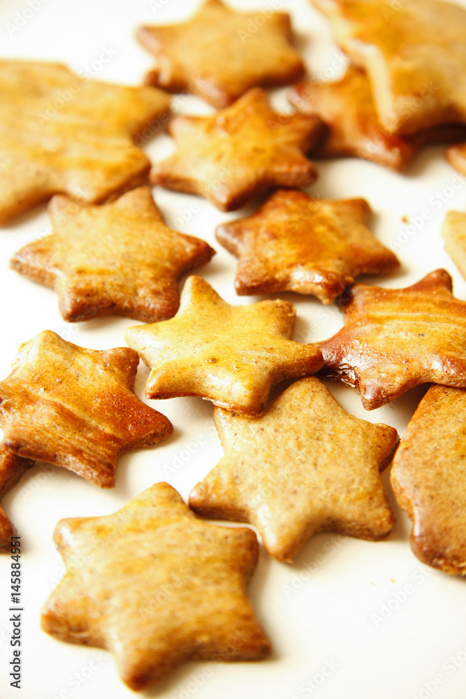 Cakes and biscuits with star shape on white background Cakes and biscuits with star shape on white background