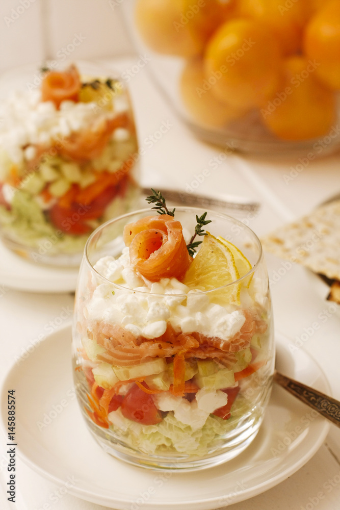Glass of dessert with fresh salmon, cream and lime Glass of dessert with fresh salmon, cream and lime