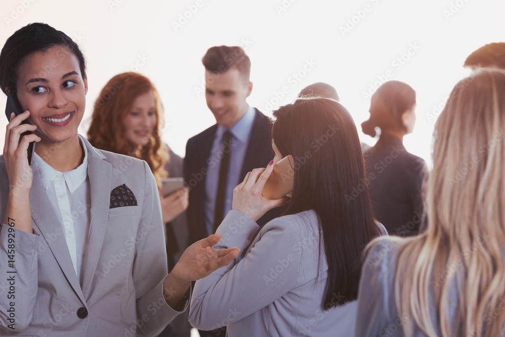 Fototapeta premium Businesswoman and her colleagues